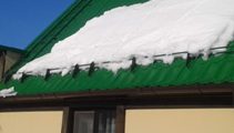 Снегозадержатель на крышу дома